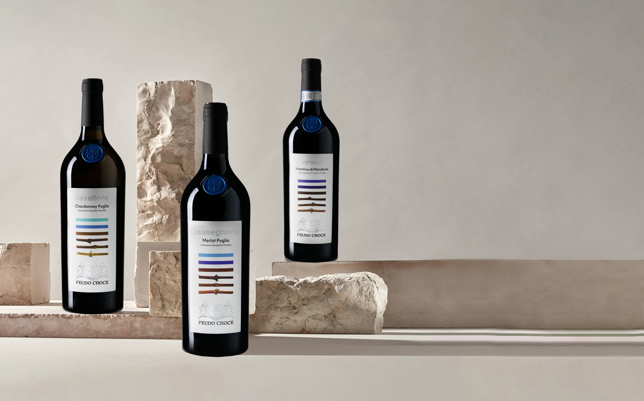 Tinazzi – Feudo Croce – bottiglie di Cavallere (Chardonnay Puglia), Cassegnano (Merlot), Croce (Primitivo di Manduria)