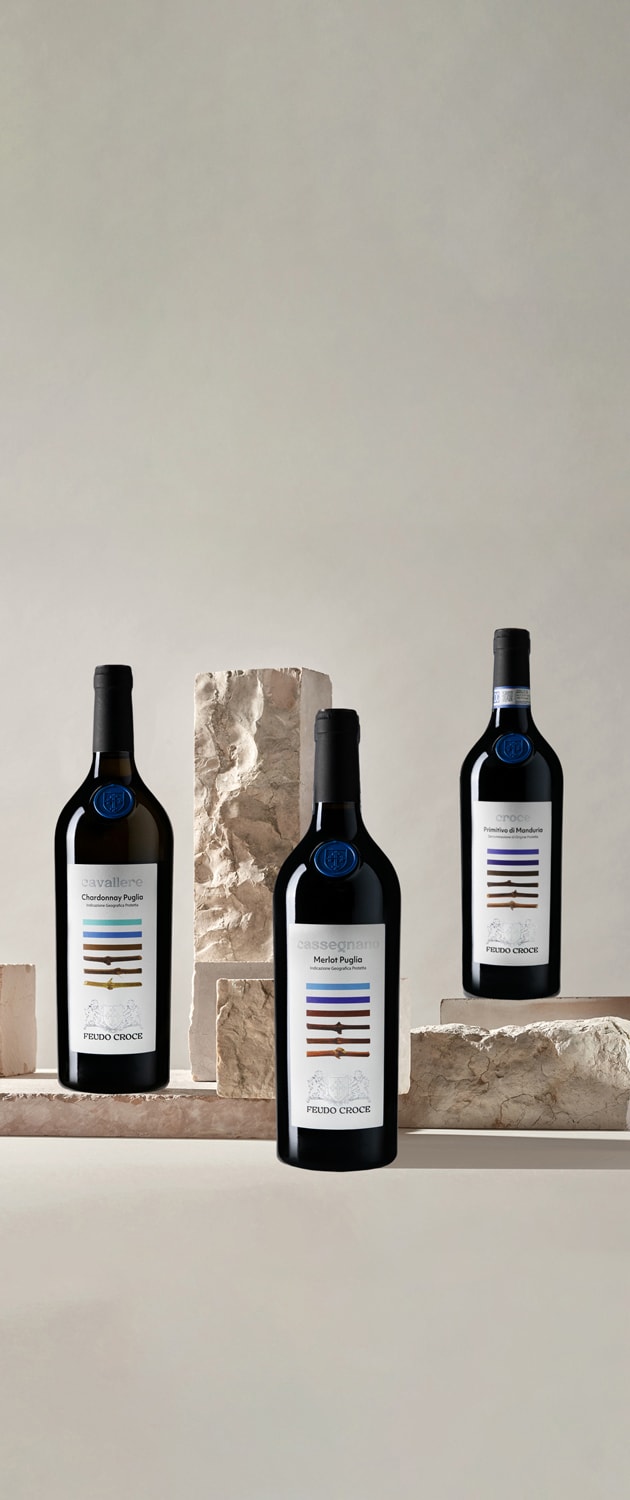 Tinazzi – Feudo Croce – bottiglie di Cavallere (Chardonnay Puglia), Cassegnano (Merlot), Croce (Primitivo di Manduria)